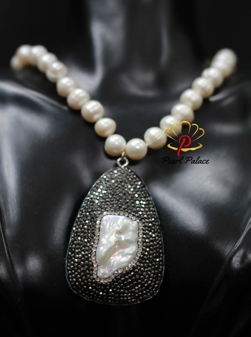 White Pearl Necklace with Black Crystal and Shell Pearl Pendant.