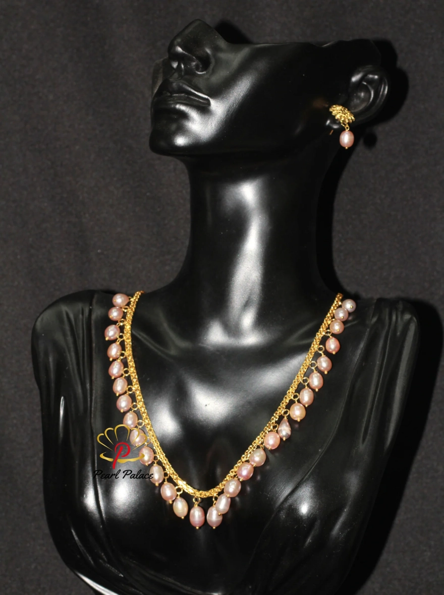Peach Rice Pearl and Gold-Plated Necklace and Earring Set.