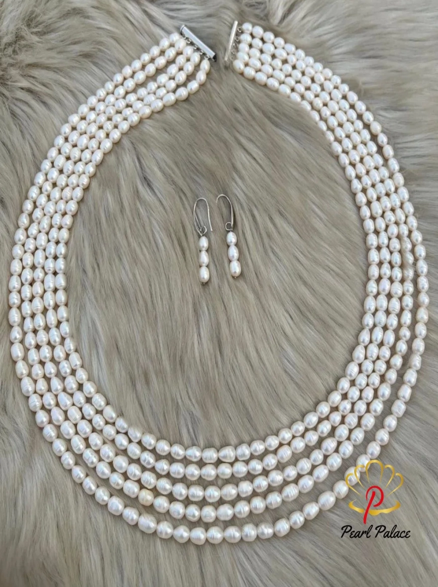 Classic White Multi-Strand Pearl Necklace Set.