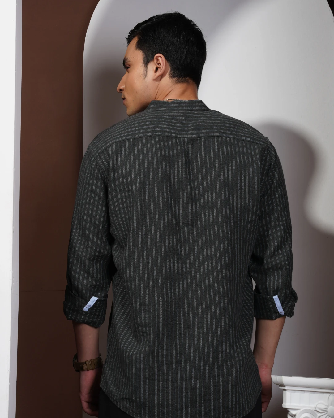 Charcoal Gray with subtle light gray vertical stripes.